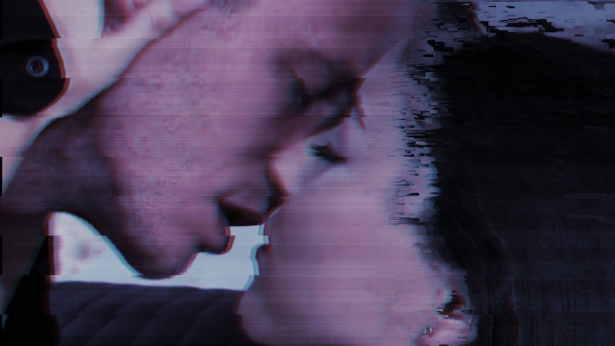 A blurry screenshot of a man kissing a woman