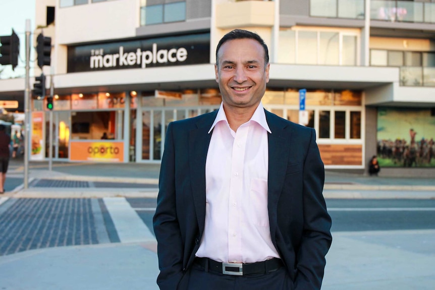 Deepak-Raj Gupta standing on a Canberra street