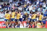 Two groups of rugby league players scrap during a match