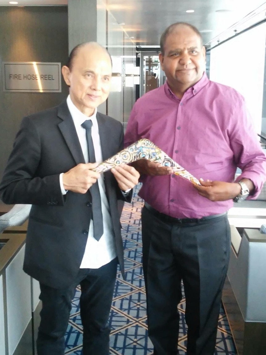 Shoemaker Jimmy Choo (L) with Noongar artist, Peter Farmer