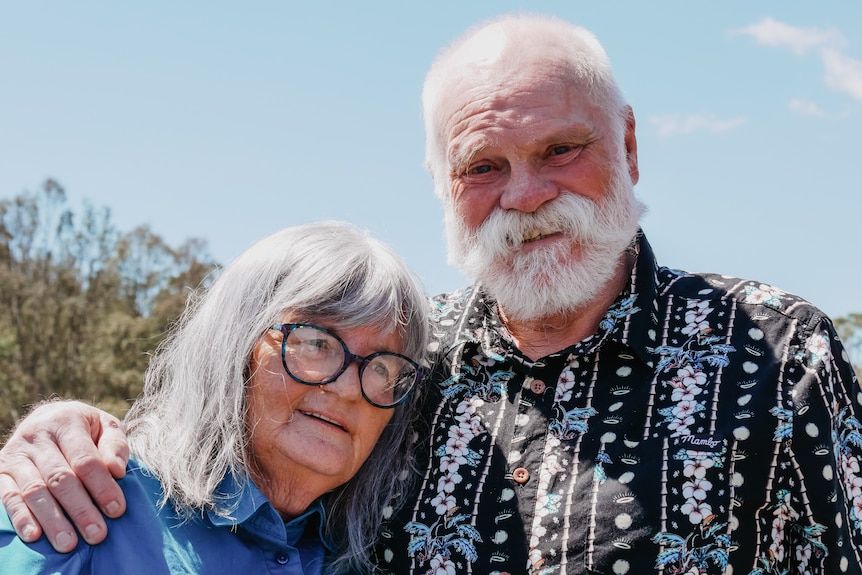 An elderly man and woman