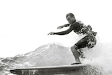 Black and white image of surfer