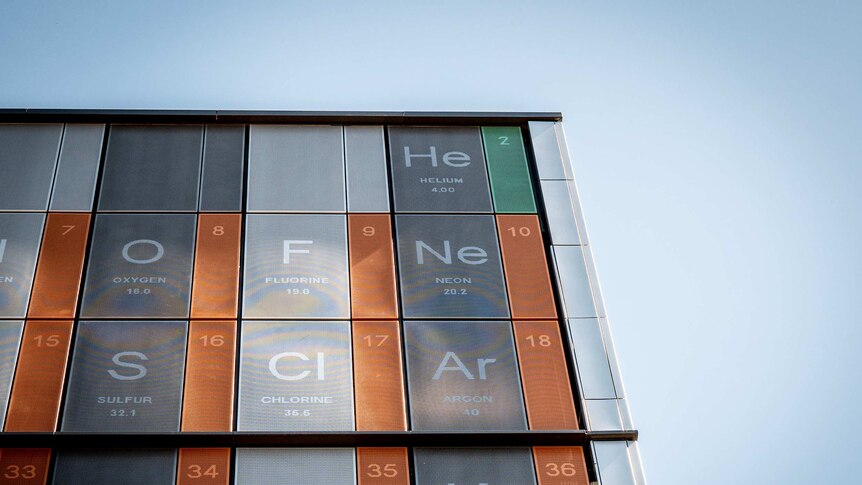Helium at the top of a periodic table on the outside of a building.