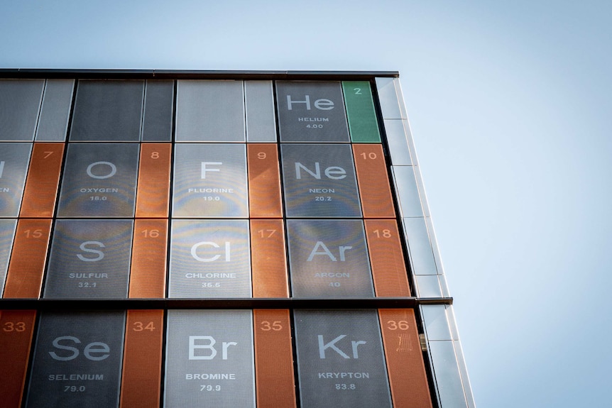 Helium at the top of a periodic table on the outside of a building.