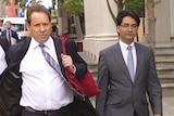 Lloyd Rayney (right) arrives at court with his lawyer in Perth