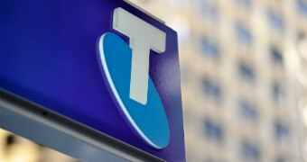 A Telstra logo on a store sign.