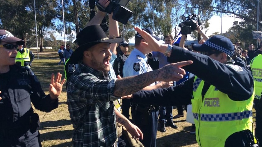 Reclaim rally clash outside Parliament House Canberra