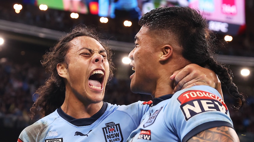 Brian To'o and Jarome Luai celebrate together with their mouths open