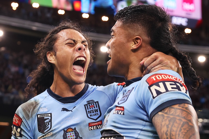 Brian To'o and Jarome Luai celebrate together with their mouths open