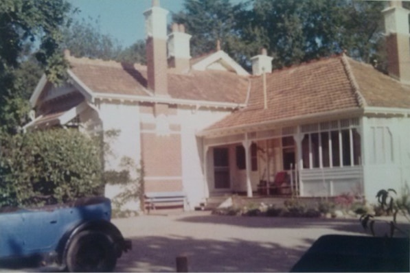 The exterior of a house and driveway.