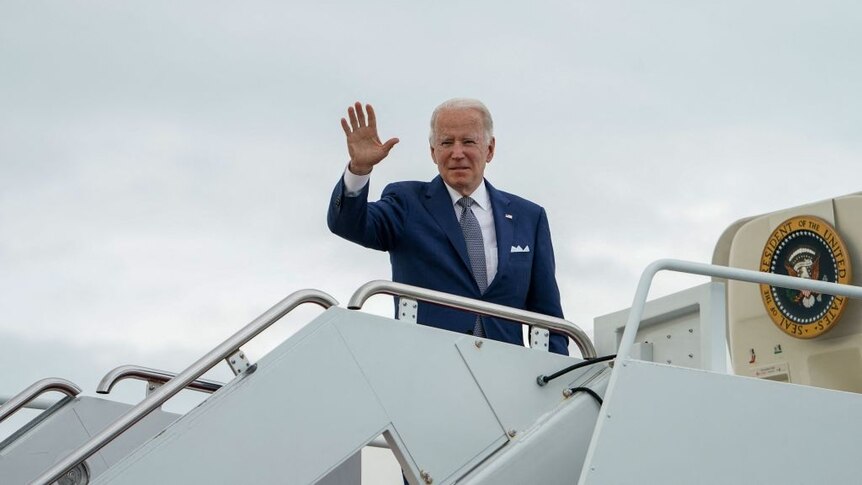 US President Joe Biden waves from air force one