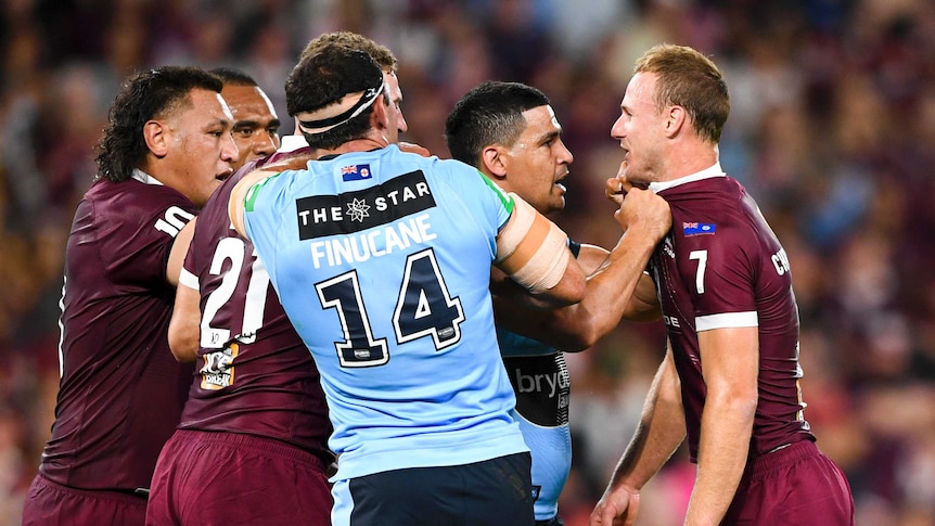 Daly Cherry-Evans and Cody Walker grapple