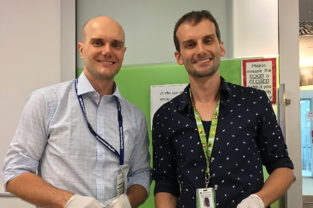 Two young male doctors in a hospital