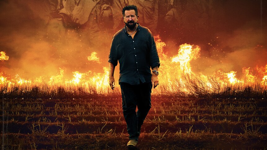 Anthony LaPaglia walking away from burning sugar cane with 'the black hand' title below him and abc logos
