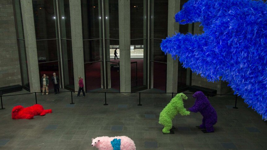 Several neon feathered bears in the foyer of Melbourne's National Gallery of Victoria on May 27 2014.
