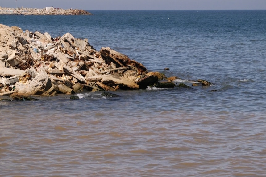 Blue water contrasts with brown water