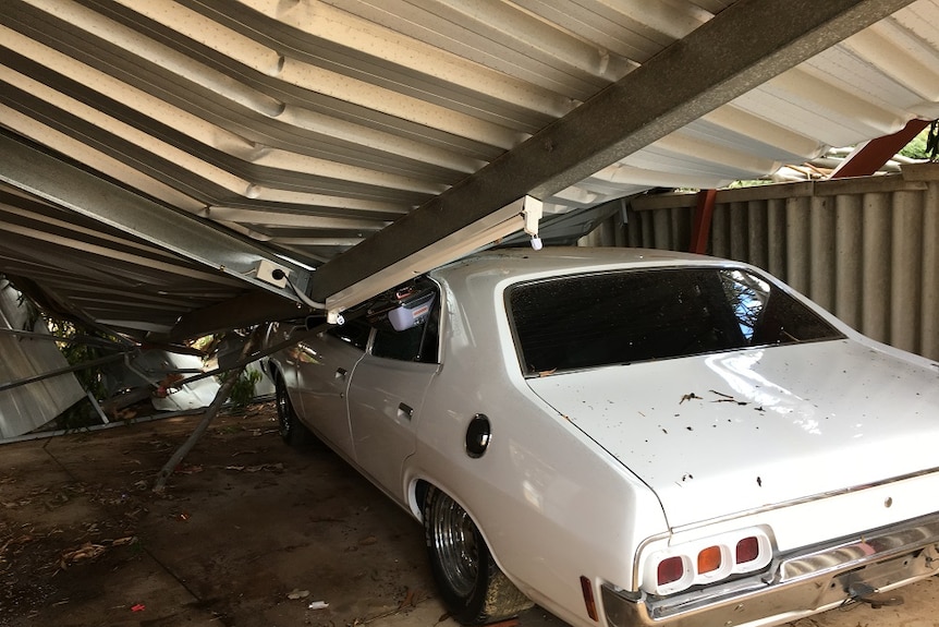 Carport roof on top of a white Falcon XA front end