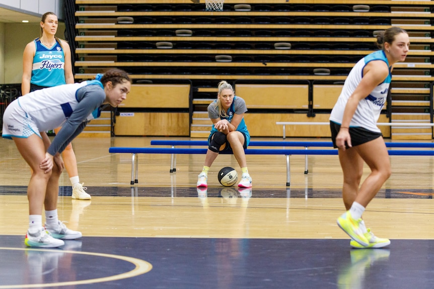 Lauren Jackson looks on during training