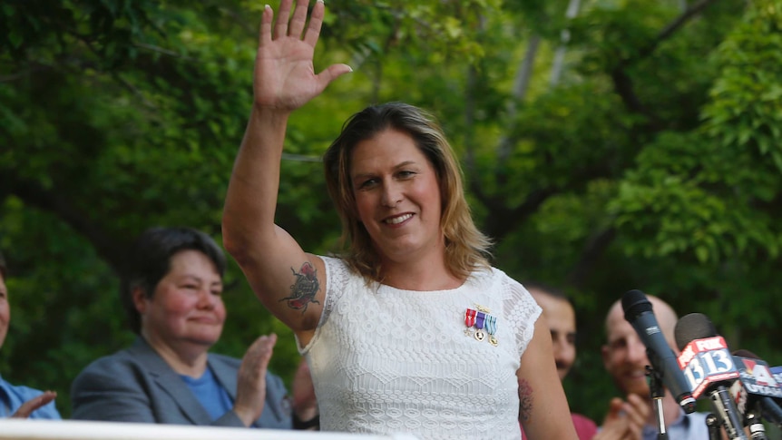 Kristin Beck waves to crowds at a same-sex marriage rally in Utah, 2014.