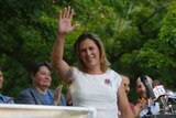 Kristin Beck waves to crowds at a same-sex marriage rally in Utah, 2014.