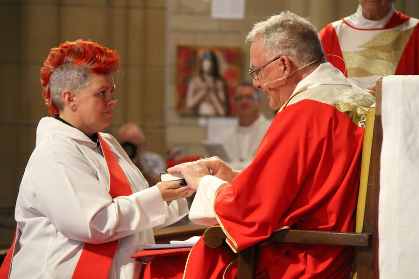 Anglican Archbishop of Brisbane Phillip Aspinall ordains a woman priest