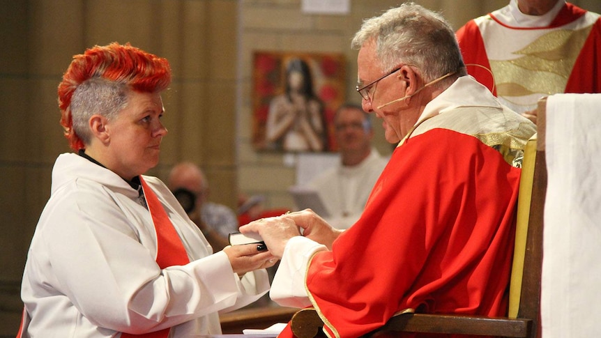 Anglican Archbishop of Brisbane Phillip Aspinall ordains a woman priest