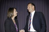 Tony Abbott and Nicola Roxon exchange unpleasantries at the end of the debate.