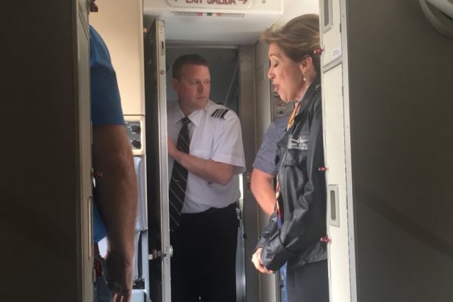 A passenger photo of the pilots after the aircraft landed