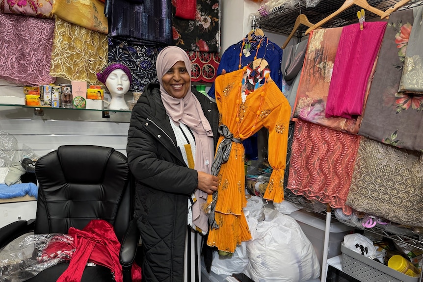 Tehiya Umel works in her sister's clothing store in Melbourne's western suburbs.