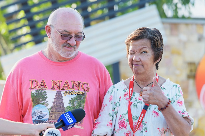 Mytran and Kenneth Donnelly are smiling at the camera