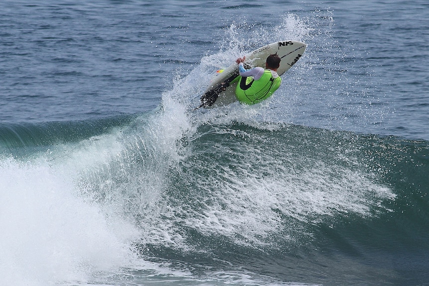 Mark Stewart surfing