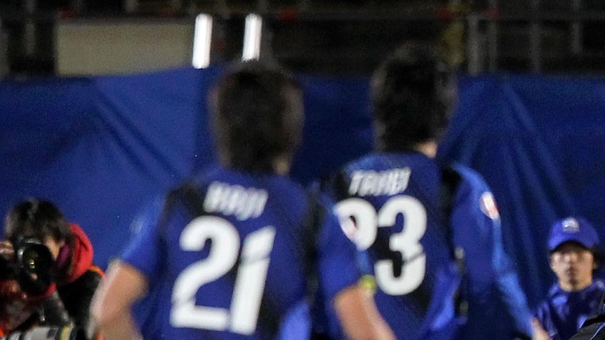 Flipping out ... Gamba Osaka's Adriano (r) celebrates his early goal against Melbourne.