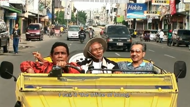 Still from documentary The Act Of Killing (YouTube: FinalCutForReal)