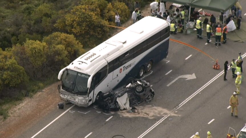 An aerial image of a car lying on its roof next to a bus after a crash on Indian Ocean Drive.