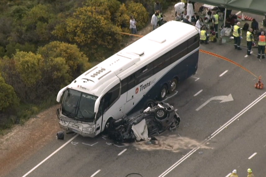 An aerial image of a car lying on its roof next to a bus after a crash on Indian Ocean Drive.