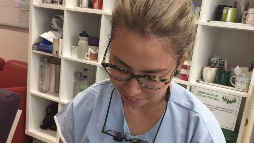A young female surgeon