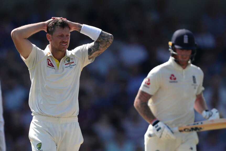 Australia bowler James Pattinson puts his hands on his head as Jonny Bairstow and Ben Stokes complete a run.
