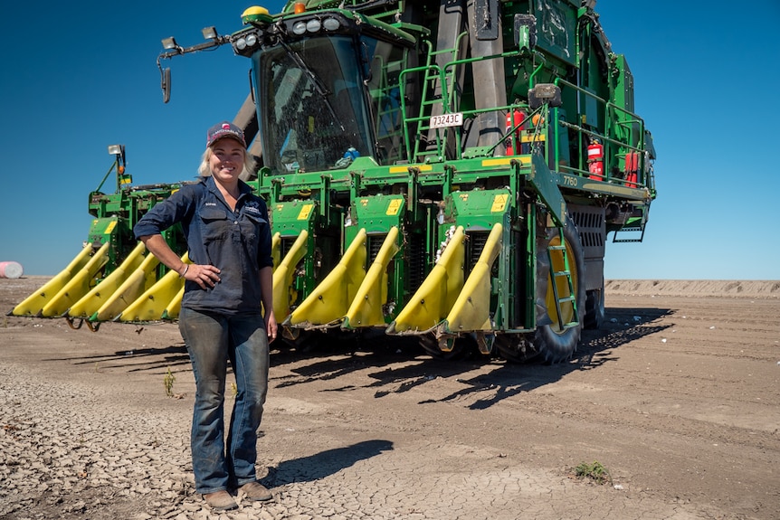 Contractor Sophie Boshammer standing in front of her cotton picker on Cubbie Station, April 2021.