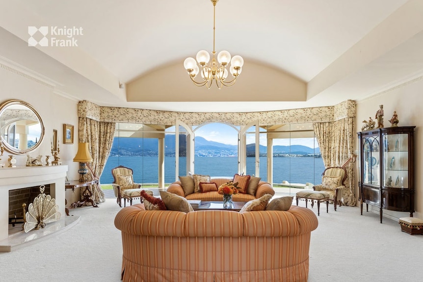 The living room at 10 Howrah Point Court, showcasing water views.