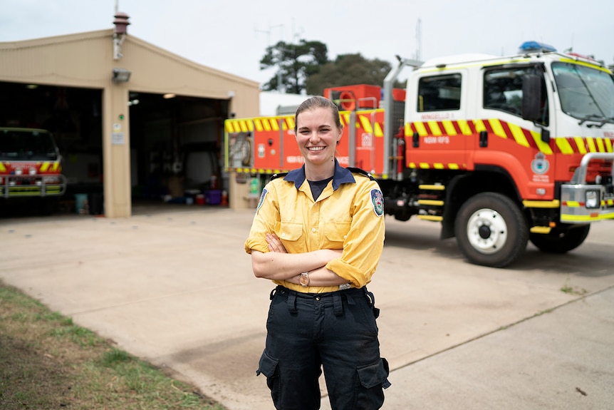 Lucy Brearley stands in front of an RFS truck out the front of the Wingello Fire Brigade.