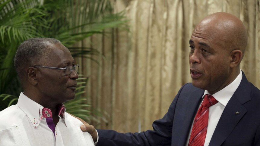 Haiti agrees on caretaker government