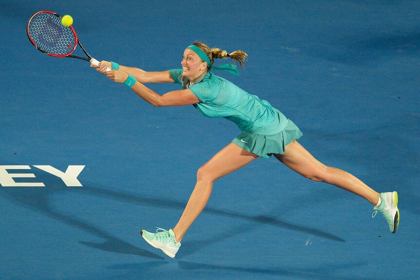 Petra Kvitova of Czech Republic plays a backhand shot in finals match against Karolina Pliskova of Czech Republic