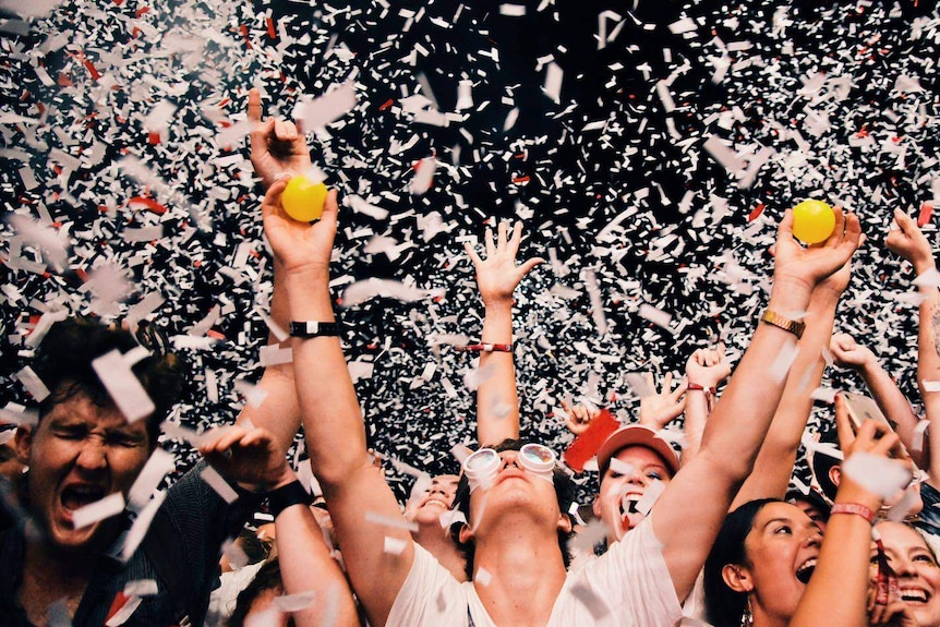 Festival crowd with confetti