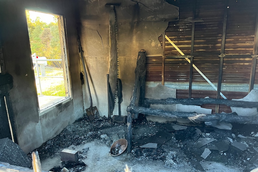 Fire damage to replica worker's hut at Rosebery Heritage Centre, Tasmania.