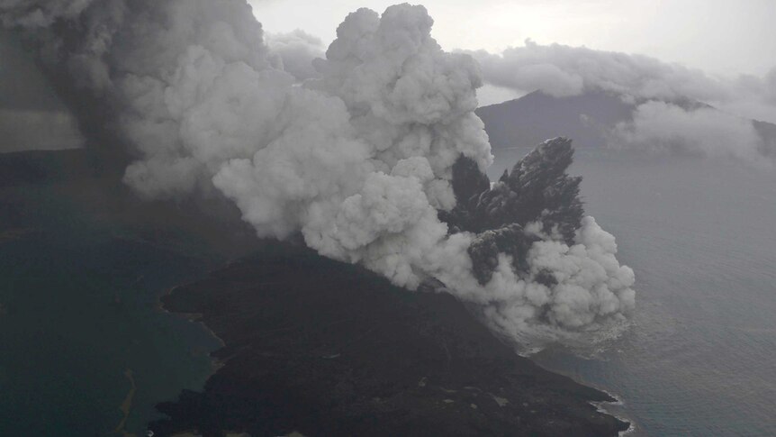 An aerial photo of Mount Anak Krakatau erupting on Java Strait, Indonesia.