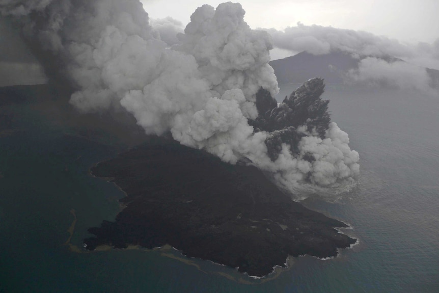 An aerial photo of Mount Anak Krakatau erupting on Java Strait, Indonesia.