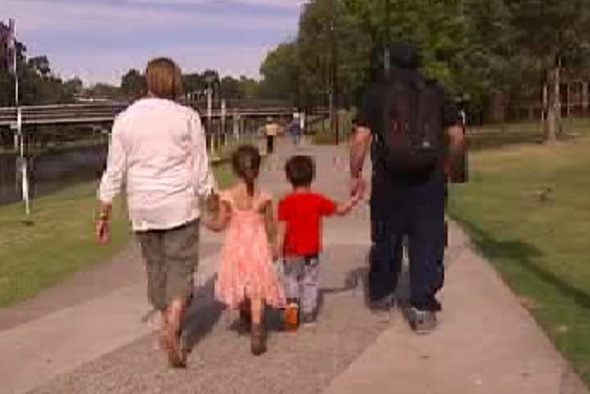 Father of abused boy walks with other children