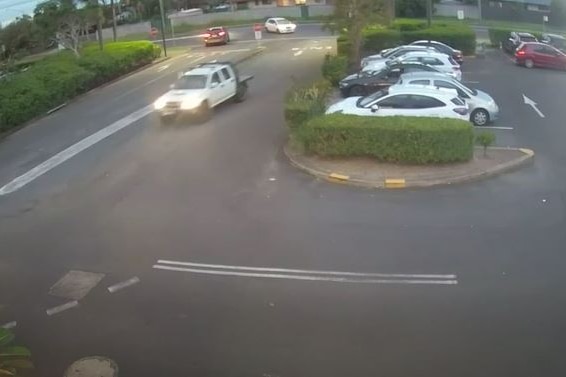 CCTV footage of a car park in the late afternoon.