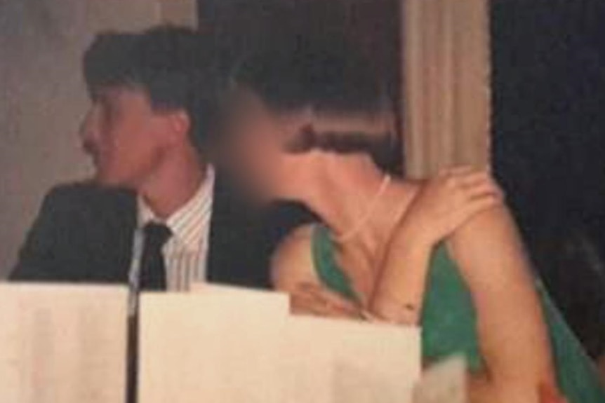 Christian Porter and a woman (with face blurred) at a dinner