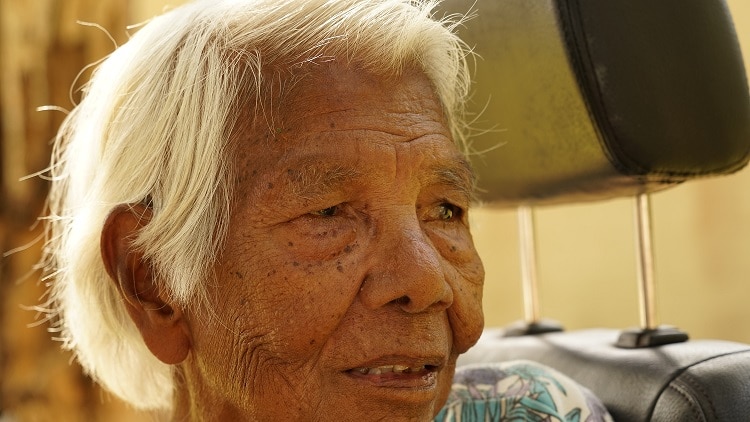 Helena Rioli sits in a mobility scooter in the remote community of Pirlangimpi.